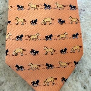 Hermes Paris men’s orange Tie w/ horses